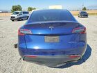 2024 Tesla Model Y Blue vin: 7SAYGDEE6RF005151