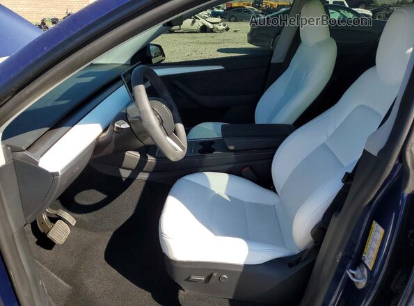 7SAYGDEE6RF005151 2024 TESLA MODEL Blue Front interior view