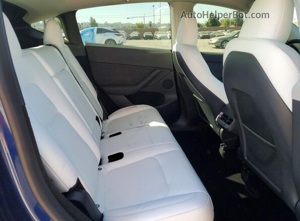 7SAYGDEE6RF005151 2024 TESLA MODEL Blue Rear seats view