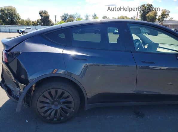 7SAYGDEE6RF041566 2024 TESLA MODEL Gray Rear interior view