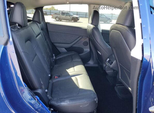 7SAYGDEE6SF305777 2025 TESLA MODEL Blue Vista interior trasera
