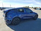 2025 Tesla Model Y Blue vin: 7SAYGDEE6SF305777