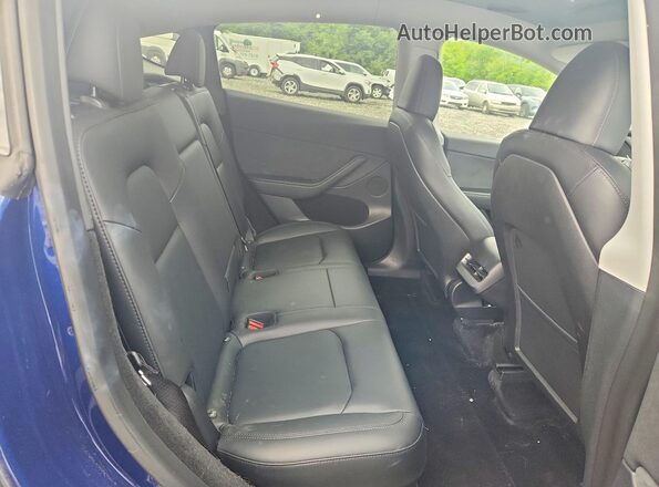 7SAYGDEE7PA093430 2023 TESLA MODEL Blue Vista de los asientos traseros