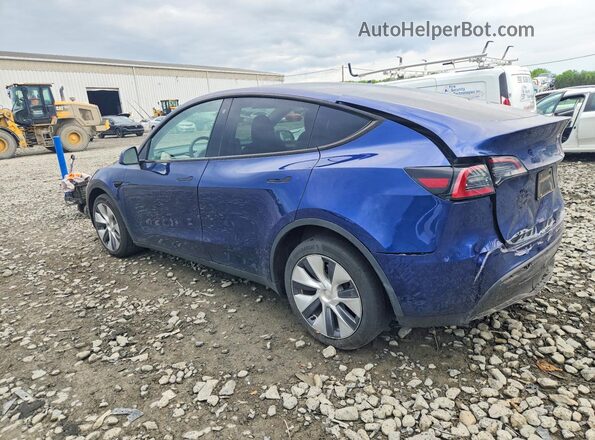 7SAYGDEE7PA093430 2023 TESLA MODEL Blue Trasero izquierdo