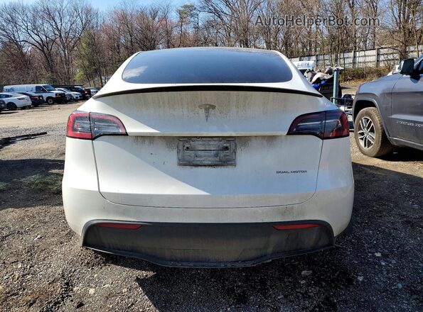 7SAYGDEE7PA129052 2023 TESLA MODEL White Rear view
