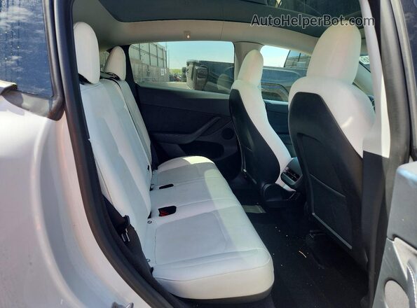 7SAYGDEE7PF616075 2023 TESLA MODEL White Rear interior view