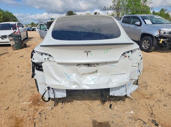 7SAYGDEE7PF690919 2023 TESLA MODEL White Հետևի տեսք