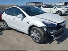 2023 Tesla Model Y Awd/long Range Dual Motor All-wheel Drive White vin: 7SAYGDEE7PF740511
