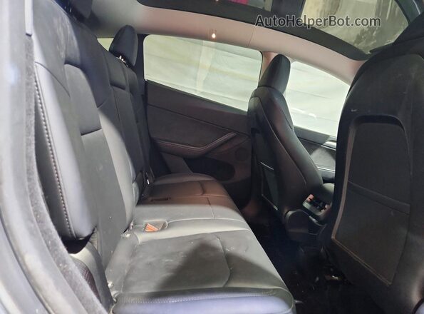 7SAYGDEE7RA290469 2024 TESLA MODEL Gray Вид задніх сидінь