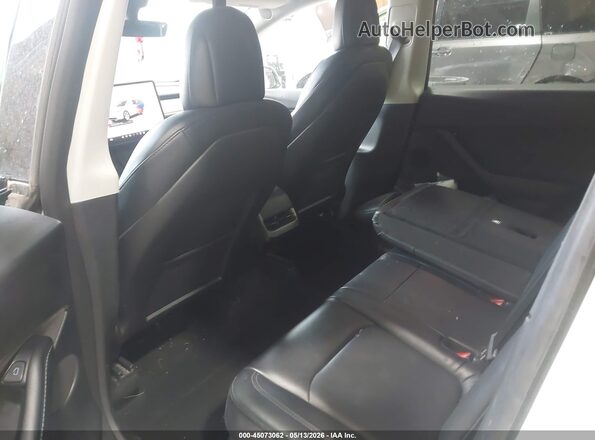 7SAYGDEE8NF438867 2022 TESLA MODEL Y White VIN sticker view