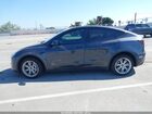 2023 Tesla Model Y Awd/long Range Dual Motor All-wheel Drive Gray vin: 7SAYGDEE8PA034175