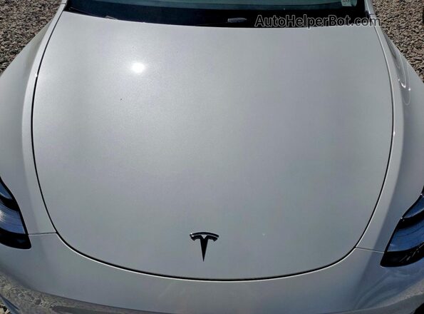 7SAYGDEE8PA097762 2023 TESLA MODEL White Widok wnętrza z tyłu
