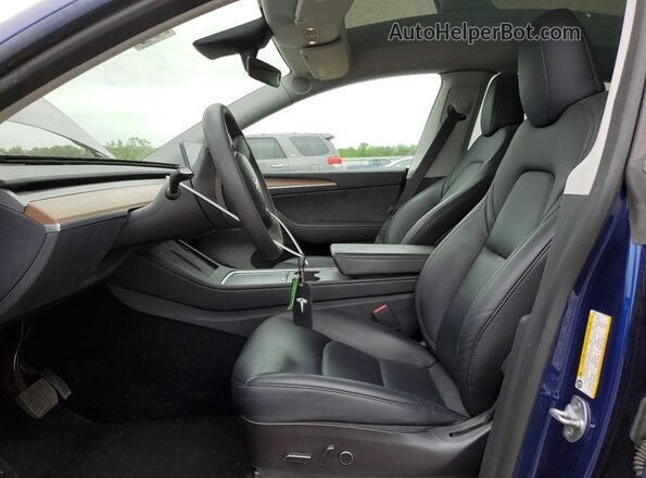 7SAYGDEE8PF704519 2023 TESLA MODEL Blue Вид салону спереду