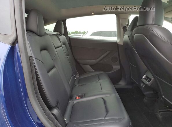 7SAYGDEE8PF704519 2023 TESLA MODEL Blue Вид задньої частини салону