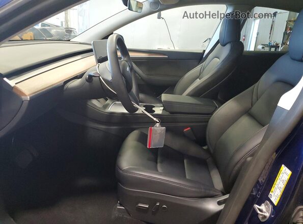7SAYGDEE8PF847003 2023 TESLA MODEL Blue Вид салону спереду
