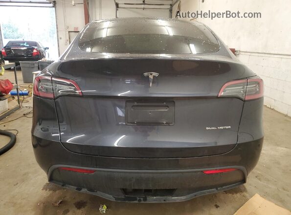 7SAYGDEE8RF176659 2024 TESLA MODEL Charcoal Rear view