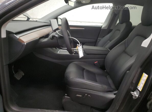 7SAYGDEE8RF176659 2024 TESLA MODEL Charcoal Front interior view