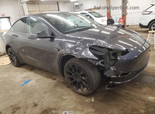 7SAYGDEE8RF176659 2024 TESLA MODEL Charcoal Front right