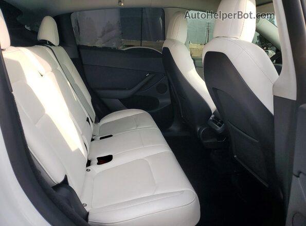 7SAYGDEE9NF558760 2022 TESLA MODEL White Rear interior view