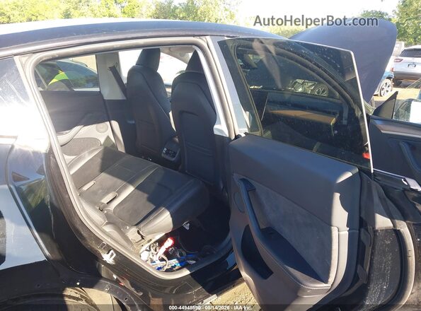 7SAYGDEE9PA142479 2023 TESLA MODEL Y Black VIN კოდის სტიკერის ხედი