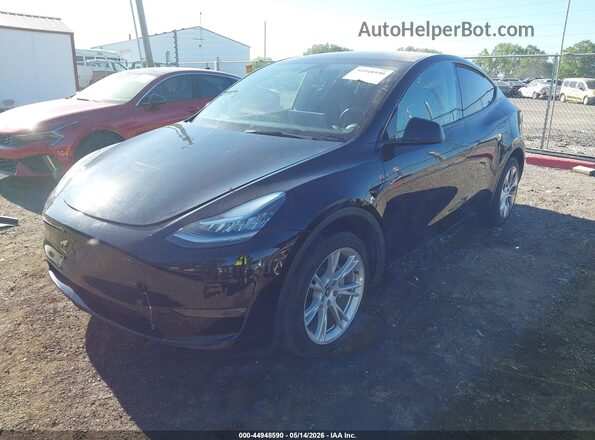 7SAYGDEE9PA142479 2023 TESLA MODEL Y Black წინა მარცხენა ხედი სამი მეოთხედიდან