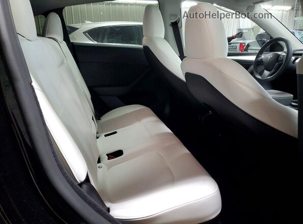 7SAYGDEE9PA166751 2023 TESLA MODEL Black Հետևի նստատեղերի տեսք