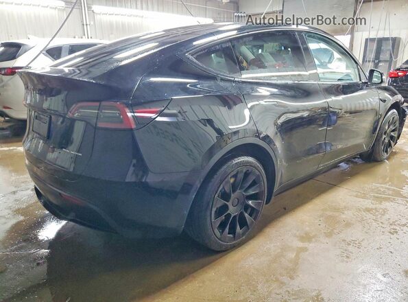 7SAYGDEE9PA166751 2023 TESLA MODEL Black Հետևի աջ
