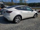 2023 Tesla Model Y Белый vin: 7SAYGDEE9PF671966