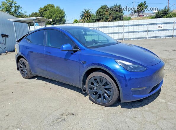 7SAYGDEE9PF748576 2023 TESLA MODEL Blue Front right