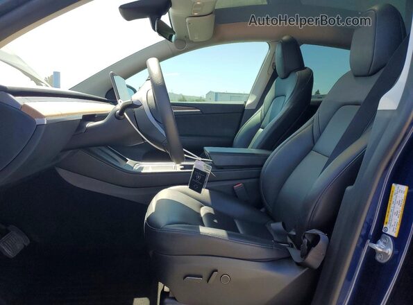7SAYGDEE9PF748576 2023 TESLA MODEL Blue Front interior view