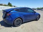 2023 Tesla Model Y Blue vin: 7SAYGDEE9PF748576