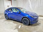 2024 Tesla Model Y Blue vin: 7SAYGDEE9RA282678