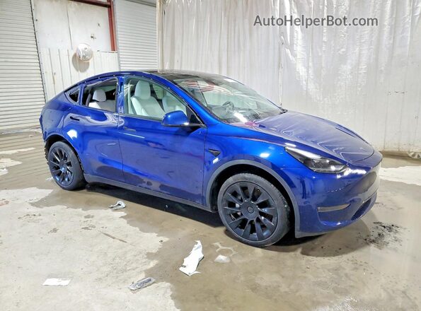 7SAYGDEE9RA282678 2024 TESLA MODEL Blue Передня права чверть