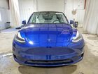 2024 Tesla Model Y Blue vin: 7SAYGDEE9RA282678