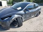 2024 Tesla Model Y Long Range Dual Motor All-wheel Drive Gray vin: 7SAYGDEE9RA329434
