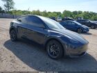 2024 Tesla Model Y Long Range Dual Motor All-wheel Drive Gray vin: 7SAYGDEE9RA329434