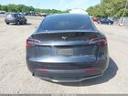 2024 Tesla Model Y Long Range Dual Motor All-wheel Drive Gray vin: 7SAYGDEE9RA329434