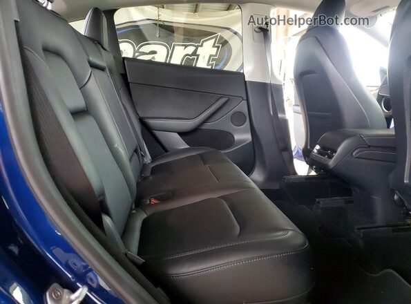 7SAYGDEE9RF982820 2024 TESLA MODEL Blue Vista de los asientos traseros