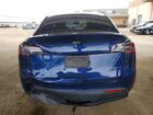 2024 Tesla Model Y Blue vin: 7SAYGDEE9RF982820