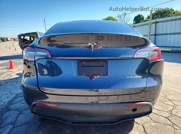 7SAYGDEE9RF994045 2024 TESLA MODEL Black Rear view