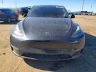 2025 Tesla Model Y Gray vin: 7SAYGDEE9SF300007