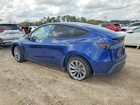 2026 Tesla Model Y Blue vin: 7SAYGDEE9TA457289