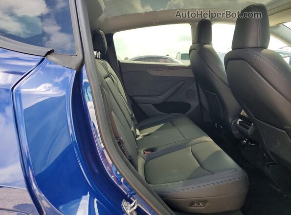 7SAYGDEE9TA457289 2026 TESLA MODEL Blue Widok wnętrza z tyłu