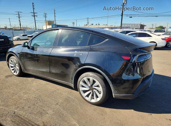 7SAYGDEE9TF366607 2026 TESLA MODEL Black Rear left