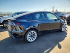 2026 Tesla Model Y Black vin: 7SAYGDEE9TF366607