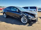 2026 Tesla Model Y Black vin: 7SAYGDEE9TF366607