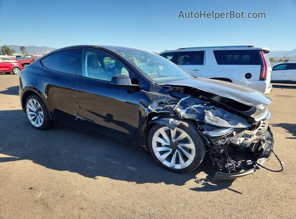7SAYGDEE9TF366607 2026 TESLA MODEL Black Front right