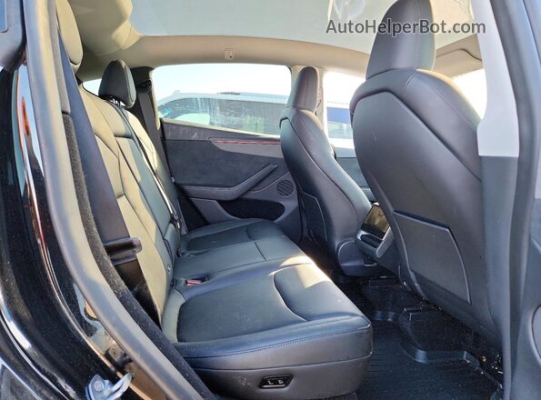 7SAYGDEE9TF366607 2026 TESLA MODEL Black Rear seats view
