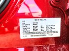 2026 Tesla Model Y Red vin: 7SAYGDEE9TF558304