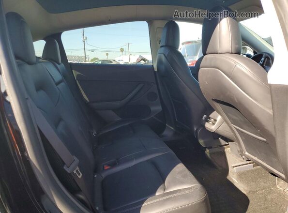 7SAYGDEEXNF318150 2022 TESLA MODEL Черный Вид задней части салона